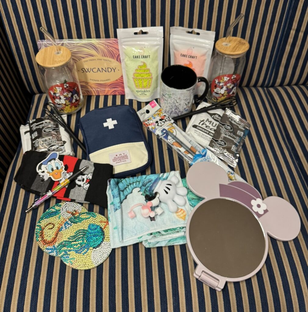Items recieved from participating in the Fish Extender program on the cruise. Various little gifts.