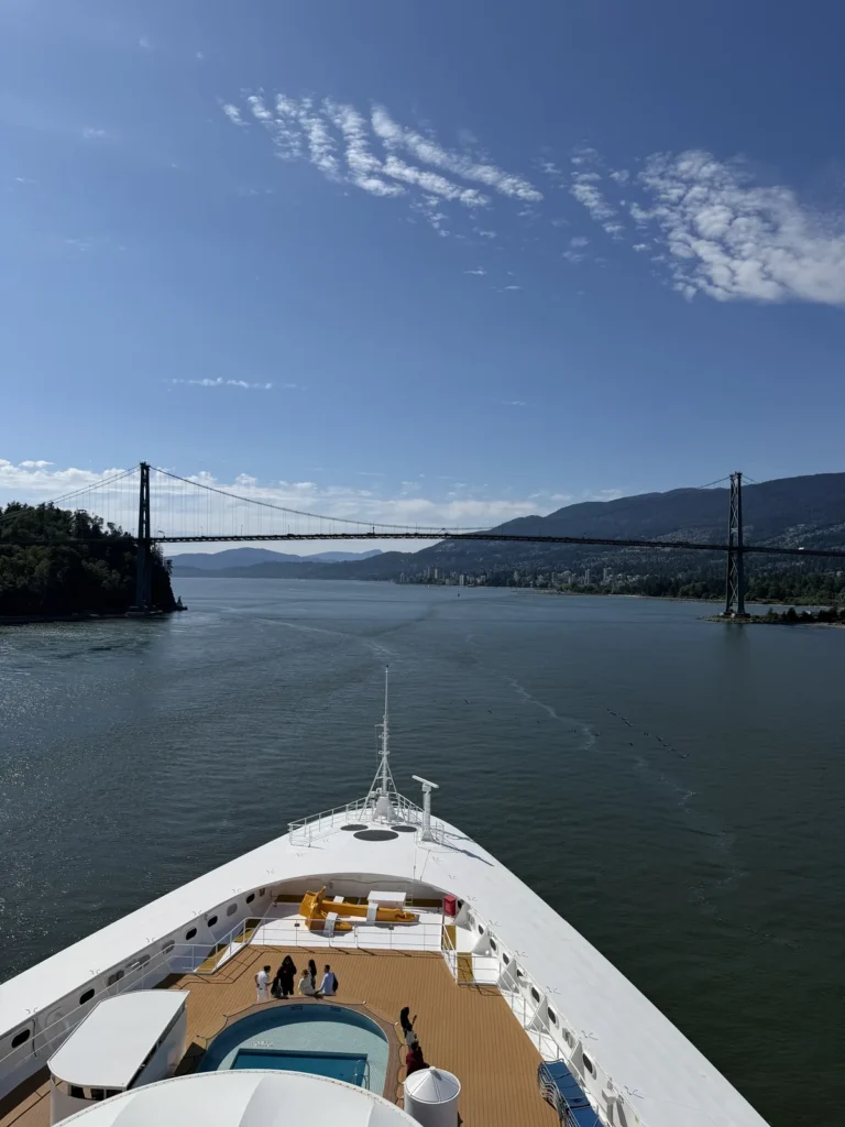 View of the bow of the Disney Magic as it is about to go under the Lions Gate Bridge