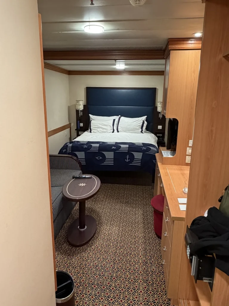 View of a Standard Inside Cabin on the Disney Magic from the door way as you enter.