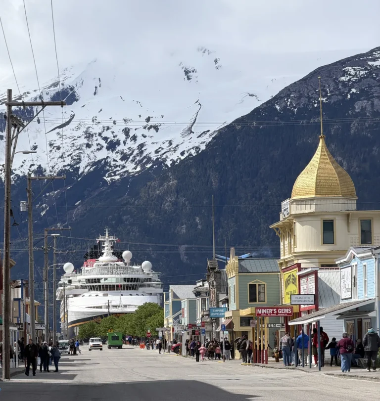 View of the Disney Magic in the back ground, looking down State Street in Skagway, AK