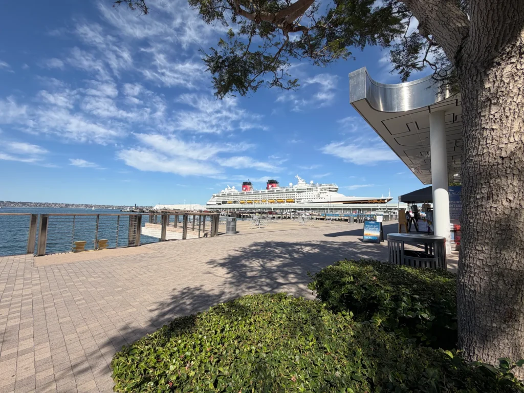 Disney Magic docked at the B Street cruise terminal, seen from the waterfront promenade across from the SpringHill Suites San Diego