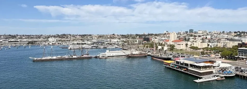 Maritime Museum of San Diego’s historic ships, including the Star of India, seen from the deck of the Disney Magic